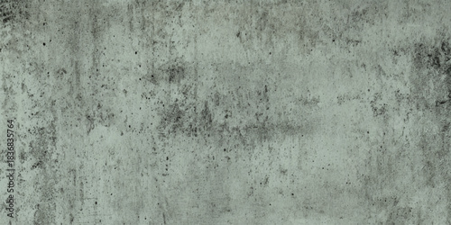 Grungy concrete wall texture industrial distressed gray cement background with rough speckled surface.