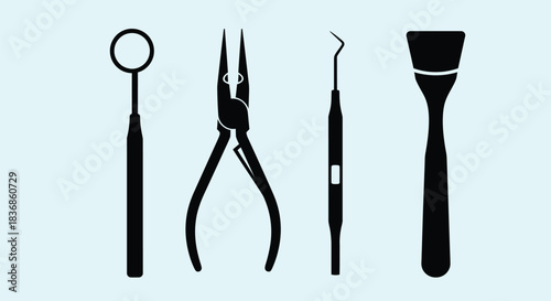 Dental tools on light blue background