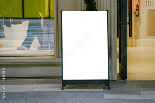 Empty blank advertising stand banners mockup. Mock up of a standing poster,  outdoor stand mockup poster display at store front