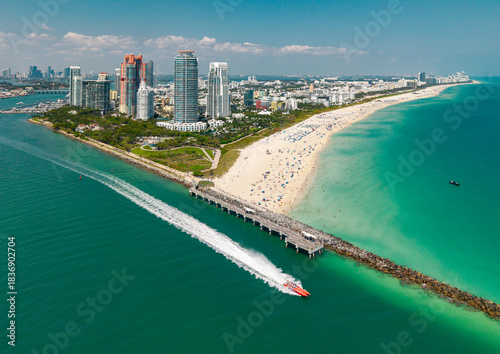 Aerial view of Miami Beach skyline. Drone shot of Miami Beach cityscape with yachts and boats on marina. South Miami Beach.