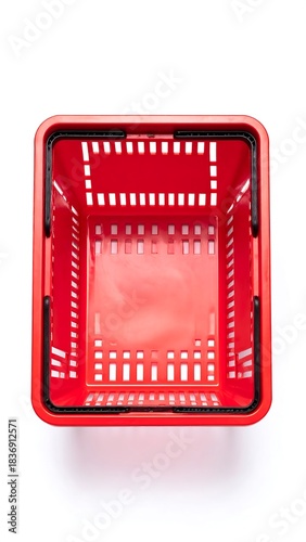Top-down view of a bright red, empty, plastic shopping basket