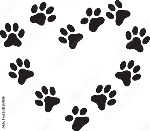 Black paw prints forming a heart shape on white animal