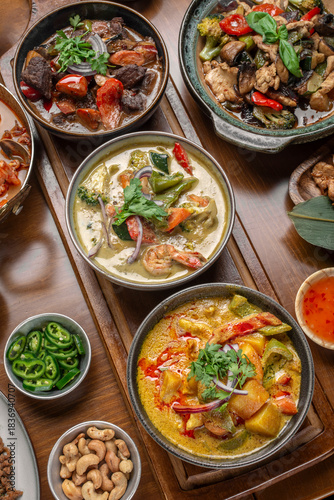 mix of traditional thai curries on restaurant table in phuket thailand