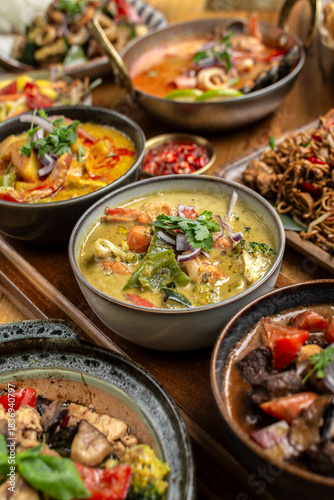 mix of traditional thai curries on restaurant table in phuket thailand