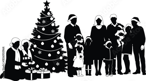 A festive family gathers around a decorated christmas tree in silhouette