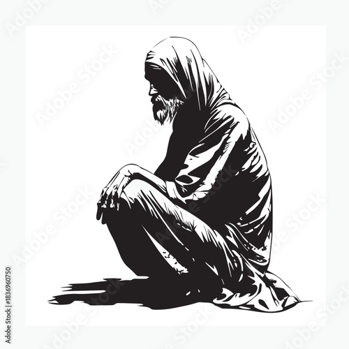 male beggar sitting on the floor
