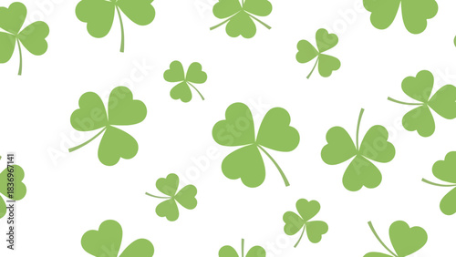 Seamless pattern of vibrant green three-leaf clovers scattered across a clean white background, perfect for festive Irish holiday designs or nature-inspired themes