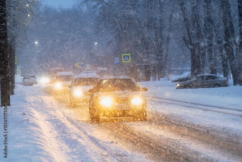  traffic jam on the road during a snowfall