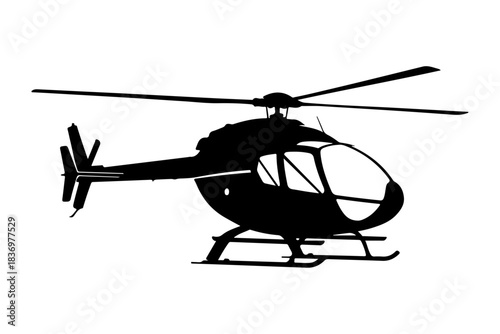 Silhouette of a modern helicopter in flight, showcasing its aerodynamic design and rotor blades