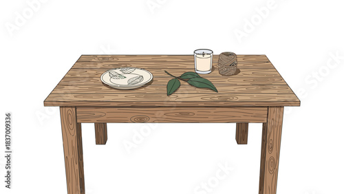 A wooden table with a plate a glass and twine