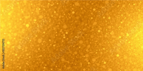 Abstract orange juice texture with golden beer bubbles and a macro liquid pattern of bright water drops on a yellow glass backdrop