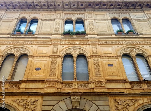 Detail of the facade of an old building in Barcelona, Spain