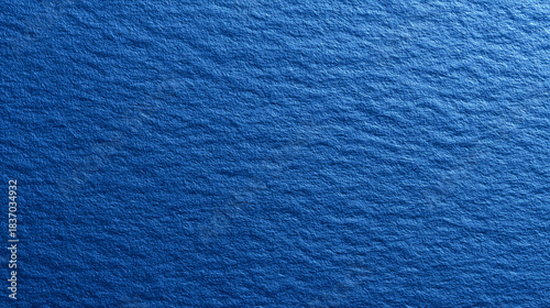 深みのある青色の紙のテクスチャ背景