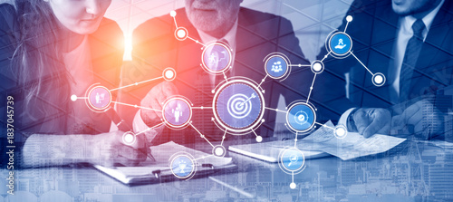 Canvas Print A modern business team engages in strategy and data analysis, utilizing digital tools and collaborative techniques to enhance planning and performance in the workplace