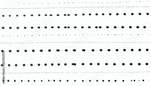 Rows of black dots, varying sizes, on a white background
