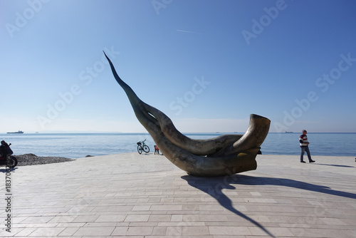 The seashell statue on Durrës beach, Albania,  reflects the city’s deep connection to the sea, blending coastal beauty with local artistry.