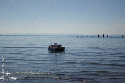 The Durrës, Albania, seafront stretches along the Adriatic in a blend of golden light, calm waves, and vibrant Mediterranean energy.