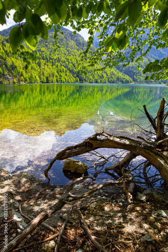 A magnificent landscape of Lake Del Predil (lago Del Predil) in Italy. Beautiful alpine lake, surrounded by Julian Alps. 