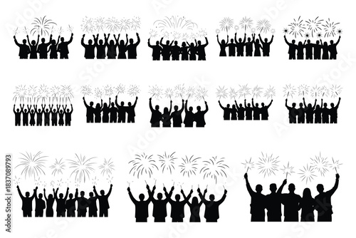 Silhouettes of people celebrating with sparklers and fireworks