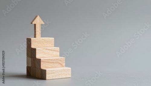 Progression and Growth with Wooden Stairs and Arrow