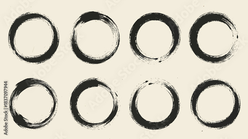 Ink Brush Circles A Collection of Eight Abstract Zen Enso Strokes in Black on a Light Beige Background