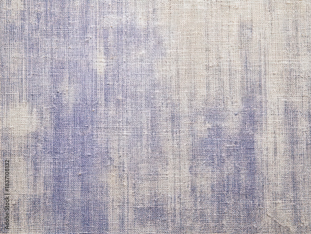 Fototapeta premium Close up of a textured woven fabric with blue and white abstract pattern textile material