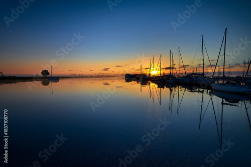Fototapeta Naklejka Na Ścianę i Meble -  boat scenery on a foggy morning at baltic sea