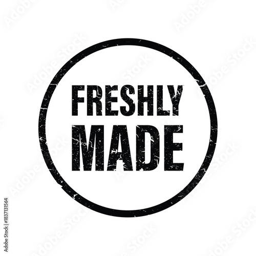 Distressed circular stamp graphic with freshly made text