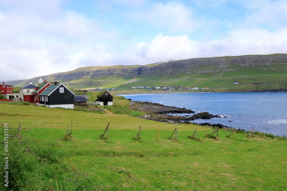 Fototapeta premium The village Sandur on Sandoy Island, Faroe Islands, Denmark