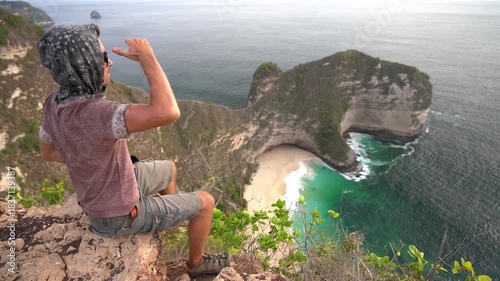 Waves rolling on Manta Bay or Kelingking Beach on Nusa Penida Island, Bali, Indonesia