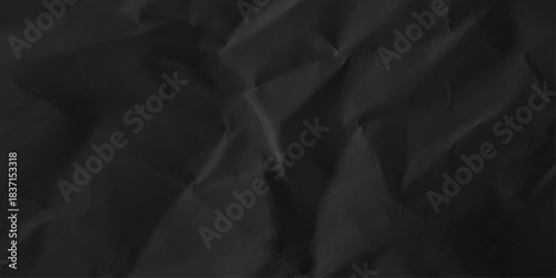 Black crumpled paper texture background. Abstract craft wrinkled kraft decorative pattern design. top view.