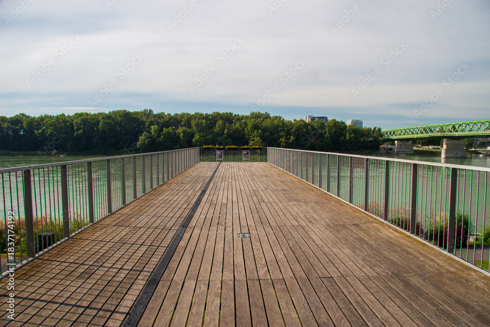 Fototapeta premium Wooden jetty above Danube river in Bratislava