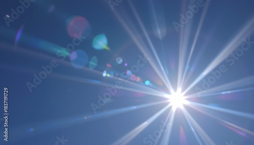 Bright Sun Radiating Light Against a Clear Blue Sky Creating a Stunning Natural Atmosphere