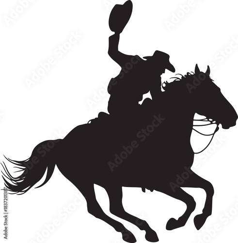 Silhouette of a cowboy on a galloping horse raising his hat