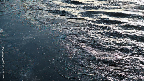 Snow river winter landscape. Frozen ice and snow by river.