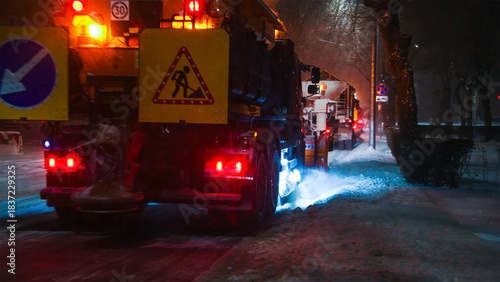 Clearing roads during a winter snowstorm