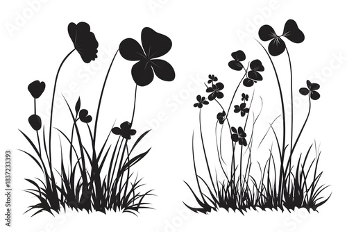 Serene Silhouette: A delicate display of stylized flowers and lush grass in elegant silhouette, capturing nature's artistry with grace and simplicity.