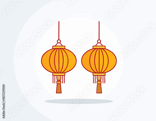 Two traditional yellow Chinese lanterns with red tassels hanging, symbolizing celebration and culture.