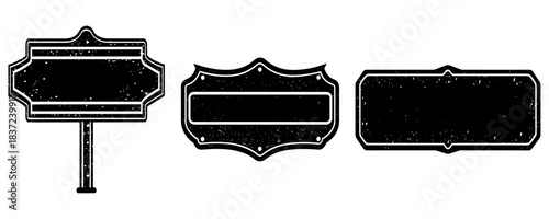 Blank vintage road-style metal sign, rust patches, leaning against wooden crates.