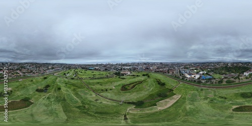 360 aerial photo taken with drone of Royal Durban golf club on overcast day in downtown Durban, South Africa