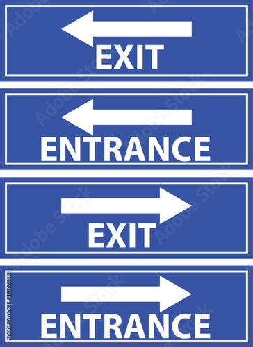 Signage Navigation: A set of blue rectangular signs direct traffic with clear guidance of entrance and exit directions.