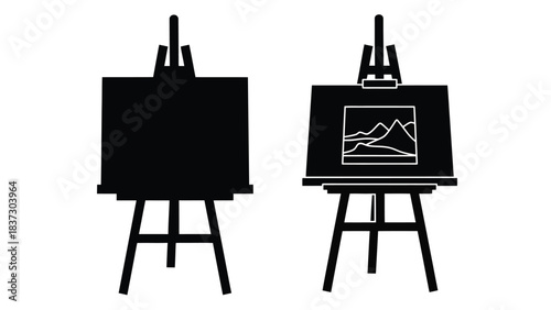 Two black art easels one blank and one with a landscape painting