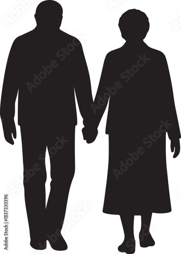Silhouette of elderly couple walking hand in hand