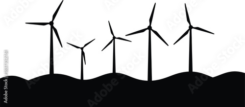 Silhouette of wind turbines against a bright white sky illustrating renewable energy