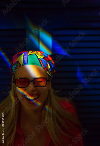 Young woman in colorful headscarf and vibrant ambiance