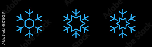 Blue snowflake icons on black background. Futuristic holiday clipart for Christmas and modern winter digital projects