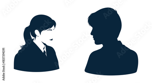 A man and woman facing each other in a dark striking silhouette
