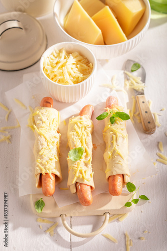 Homemade hot dogs with chee...