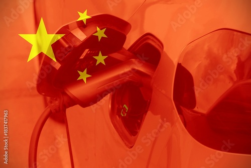 Electric car charging by a Chinese flag