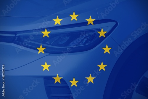 Close up car with the European flag as background.